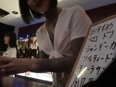 Tattooed Asian babe with small tits has a passion for cock