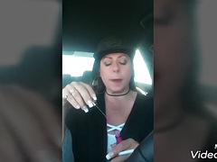Laura smokes in the car