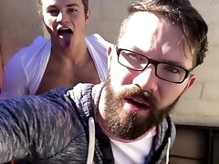 Nerdy gay hipster gets down on his knees to suck his friends dick