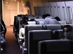 Busty Japanese wife satisfies her desire for cock on a plane