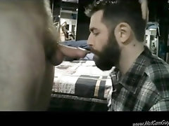 Bearded guy gets face fucked by big curved cock and swallows all the cum.