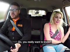 Busty English babe rides cock in the car during lesson