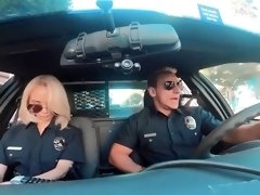Stunning blonde police officer flashes her fabulous big tits